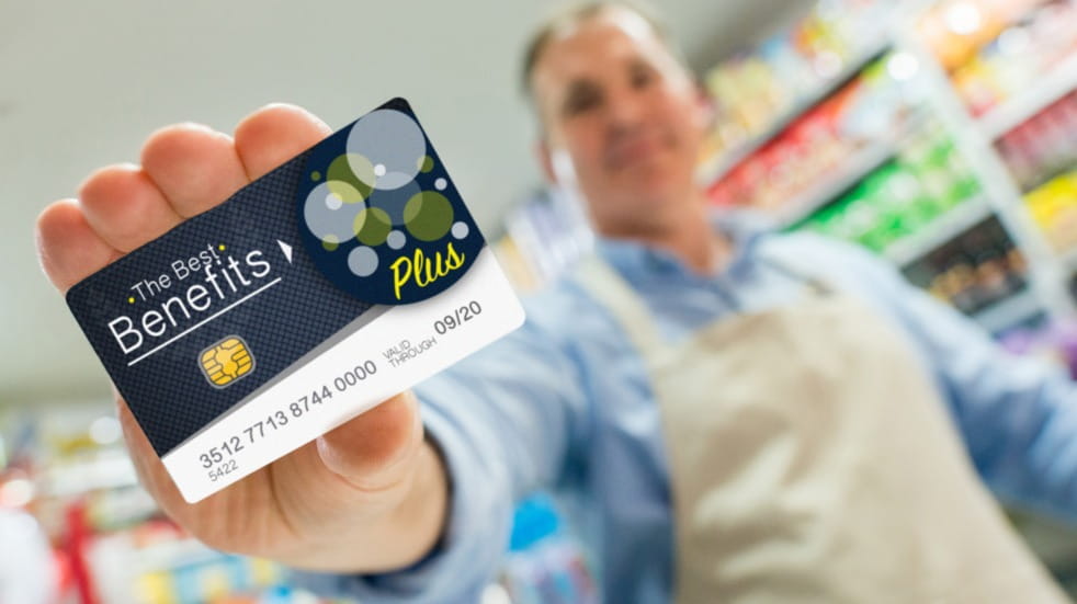 Man holding a reward card